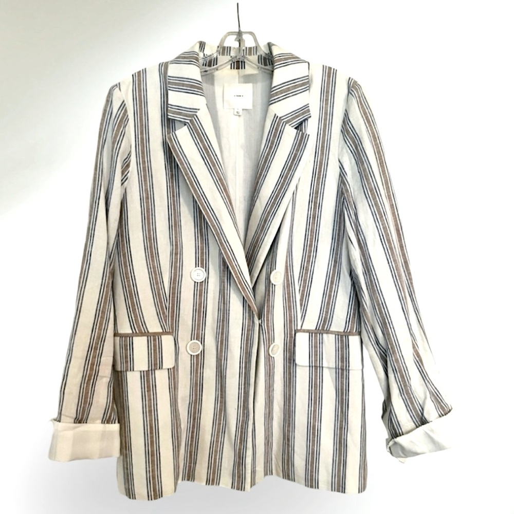 A loves a white,blue and tan striped linen blazer. Size Large